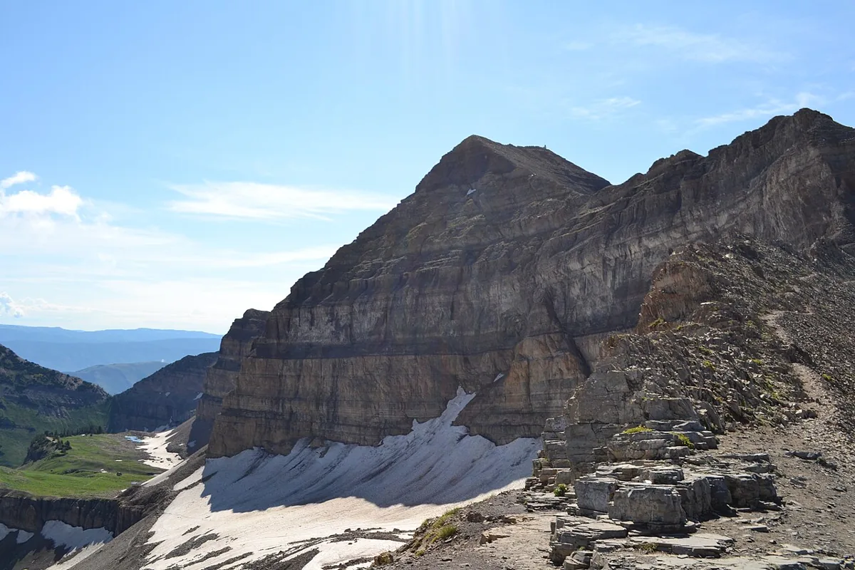 The summit ridge of Mount Timpanogos seen from the saddle, with the trail along the right side