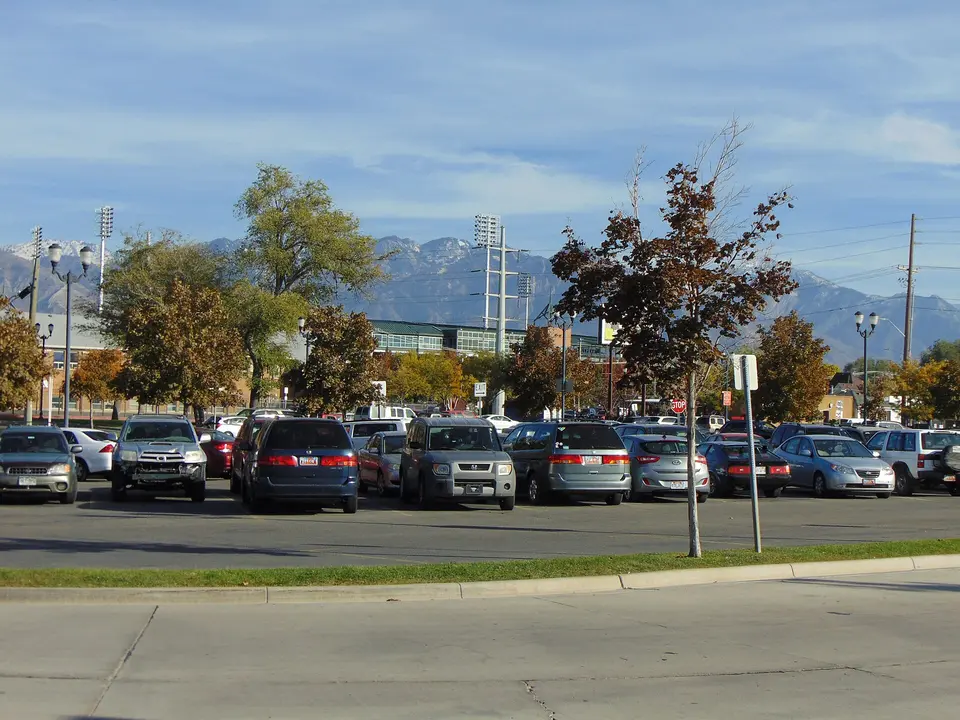 The Ballpark station Park and Ride lot in Salt Lake City with Smith's Ballpark and the Wasatch Range behind it