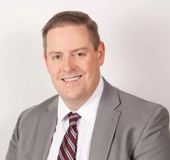 Official-page portrait of Sheldon Stewart