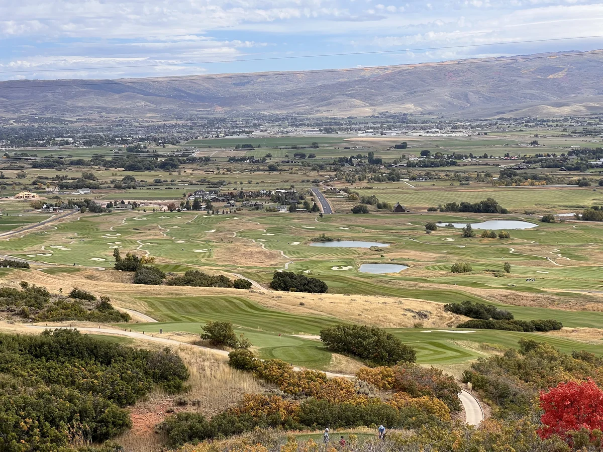 Striped fairways, bunkers and ponds at Soldier Hollow Golf Course above Heber Valley