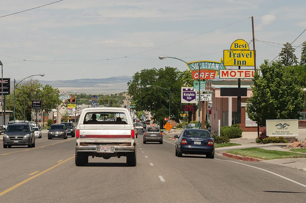 Main Street in Cedar City looking north, with motel signs and traffic